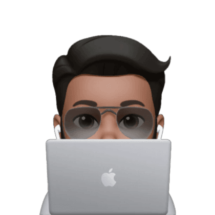 Person peeking from behind laptop